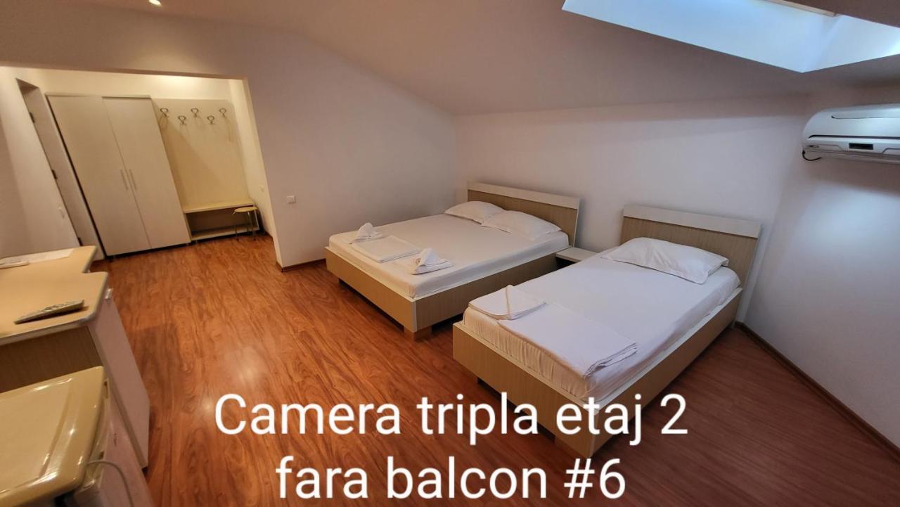 Cameră triplă cu baie