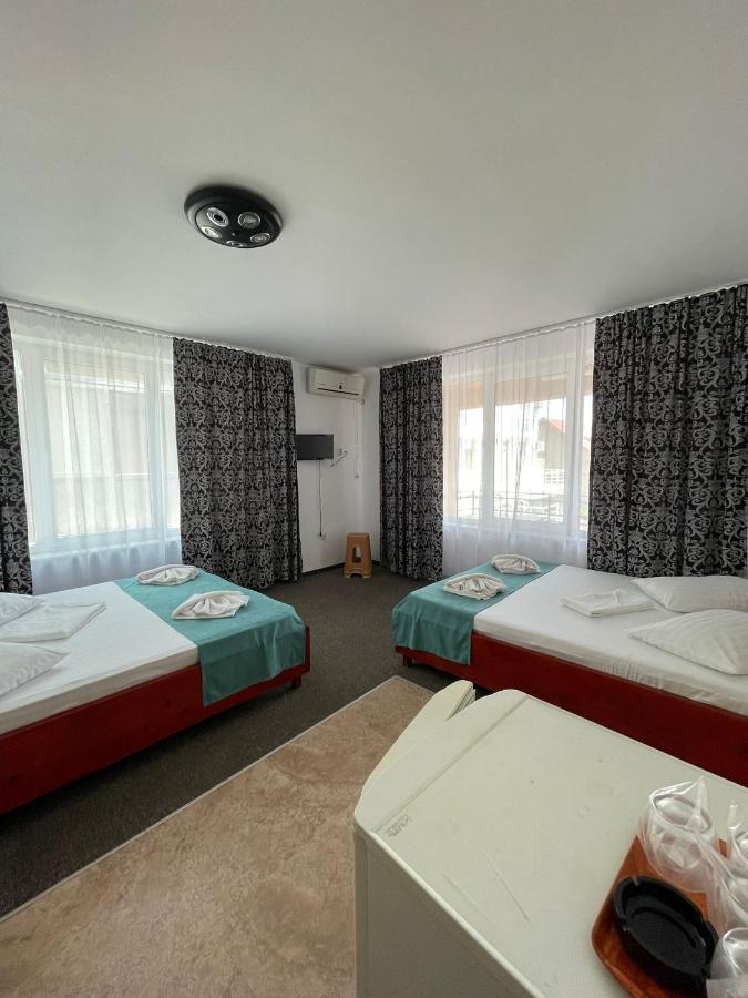 Cameră cvadruplă cu balcon