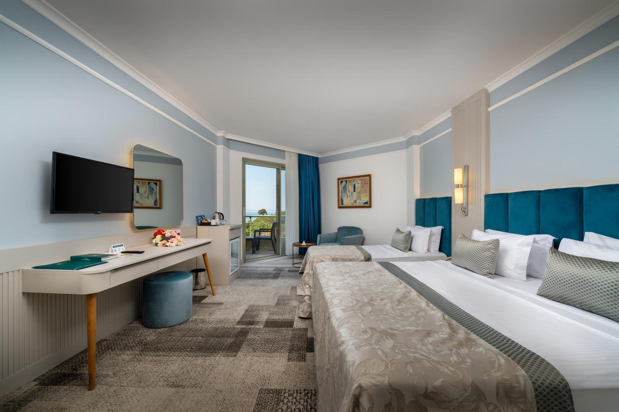 Double or Twin Room with Partial Sea View,1566931430:JPEG