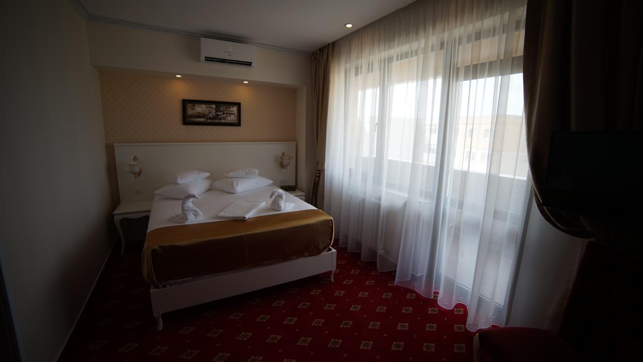 Cameră de familie, cu vedere laterală la mare
